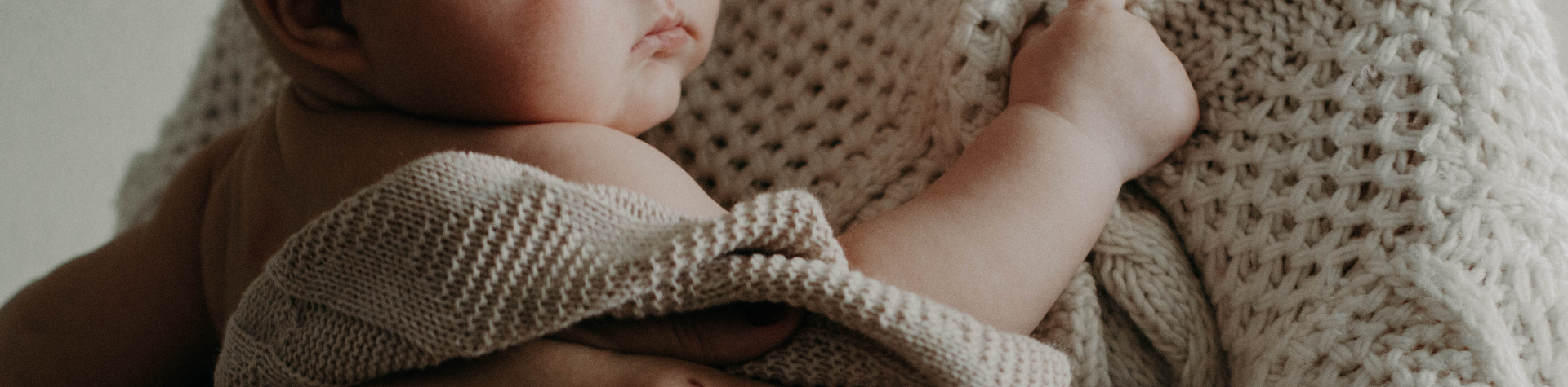 mother holding her baby