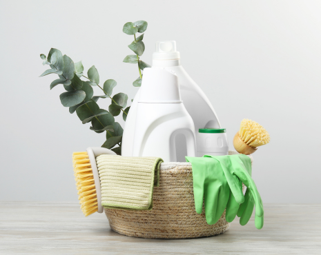 basket full of laundry items and cleaning supplies