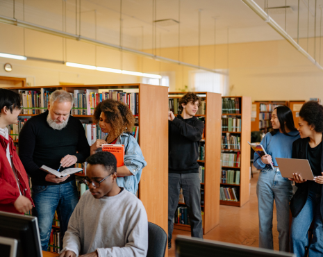 seven individuals in a library