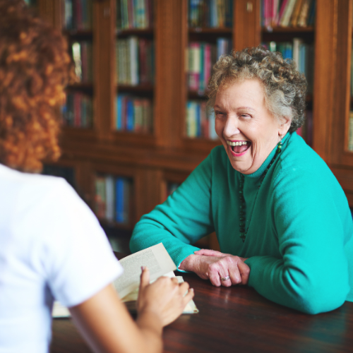 volunteer meeting with older lady