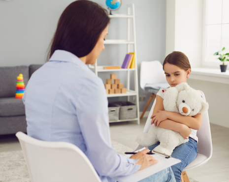 counselor speaking with a girl