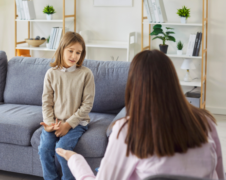 counselor speaking with a girl