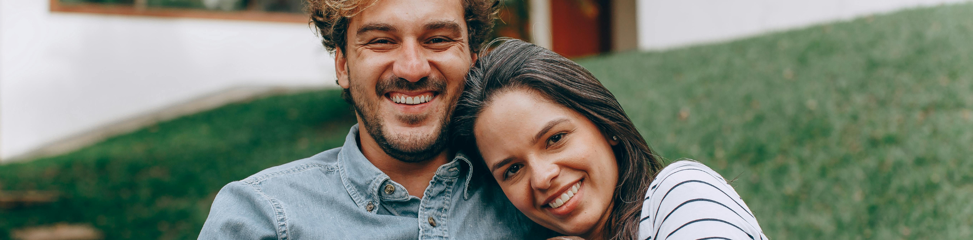 young couple with dog header
