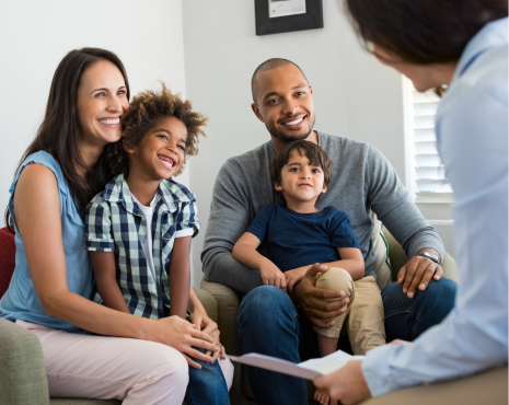 a family of four in a counseling session